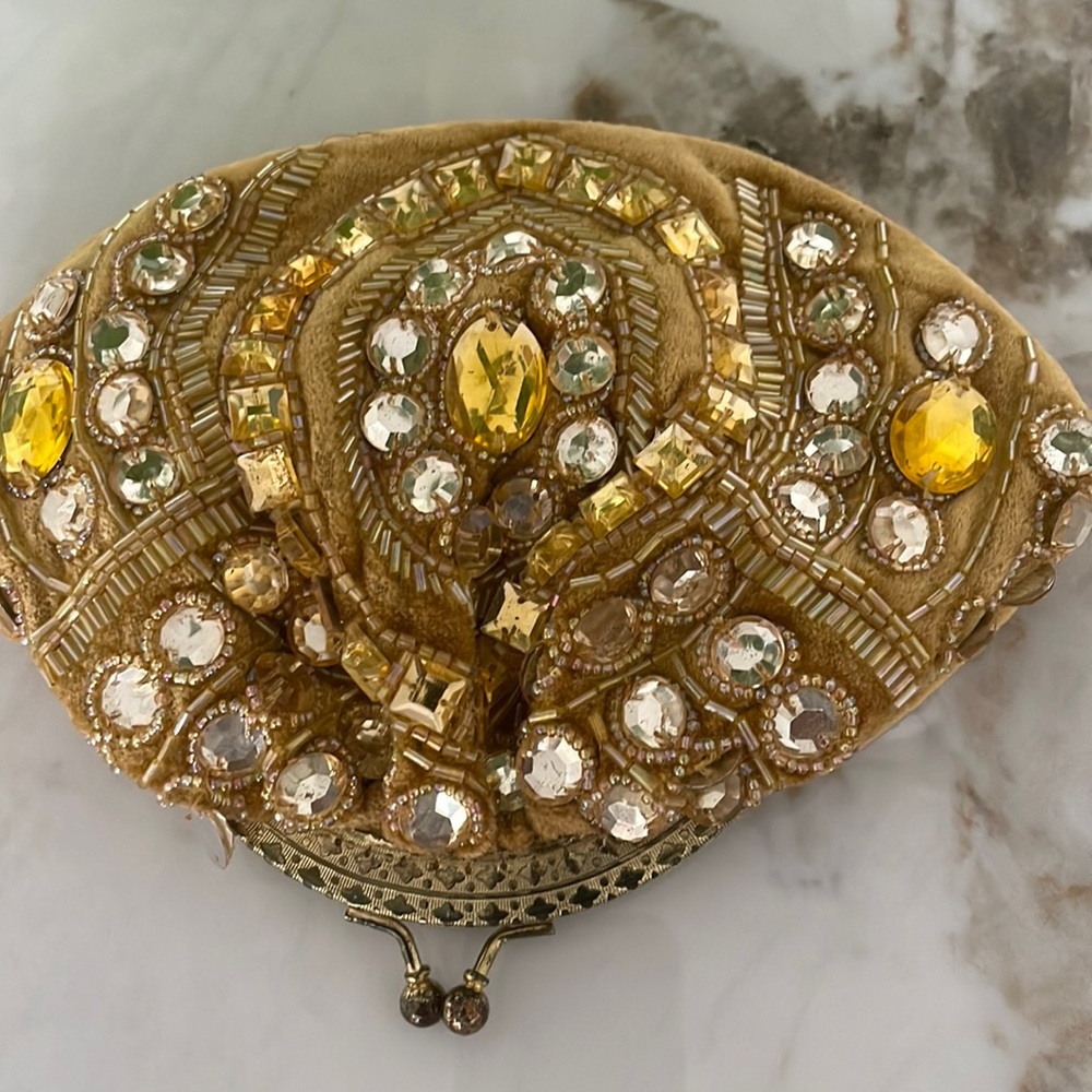 Moyna goldenrod rhinestone and embroidered velvet clutch.